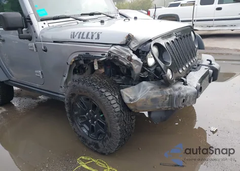 2016 Jeep Wrangler Willys Wheeler z USA, uszkodzony, nr VIN 1C4AJWAG8GL248344